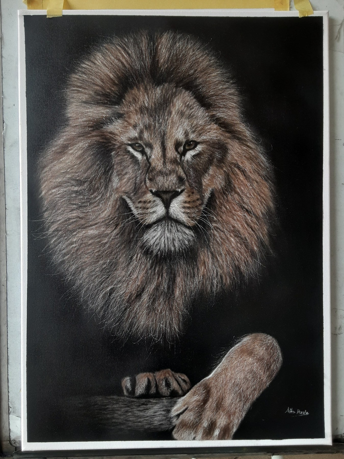 Lion portrait artwork on a dark background